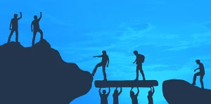 Deux personnes avancent sur une planche tenue par quatre autres, symbolisant le leadership soutenu par la coopération et la confiance.