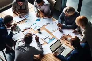Réunion d’équipe professionnelle discutant du financement des formations en entreprise.