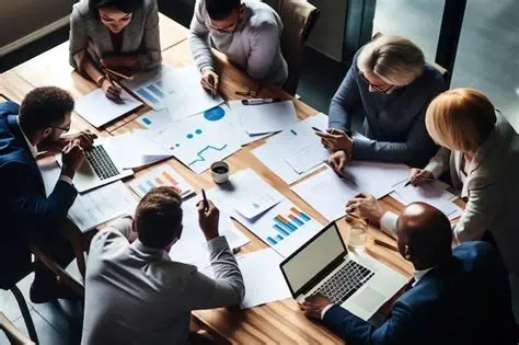 Réunion d’équipe professionnelle discutant du financement des formations en entreprise.